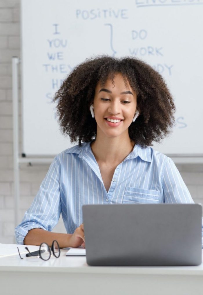 teacher-works-online-during-quarantine-woman-chatting-with-students-at-online-lesson-in-living-room-